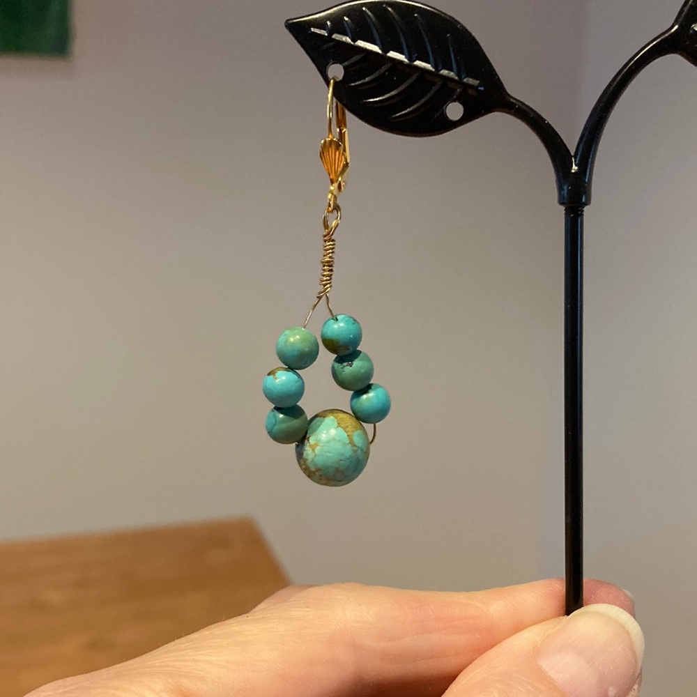 Genuine turquoise bead earrings.  Handmade.  Pierced. L:  2 in. W:  3/4 in.
